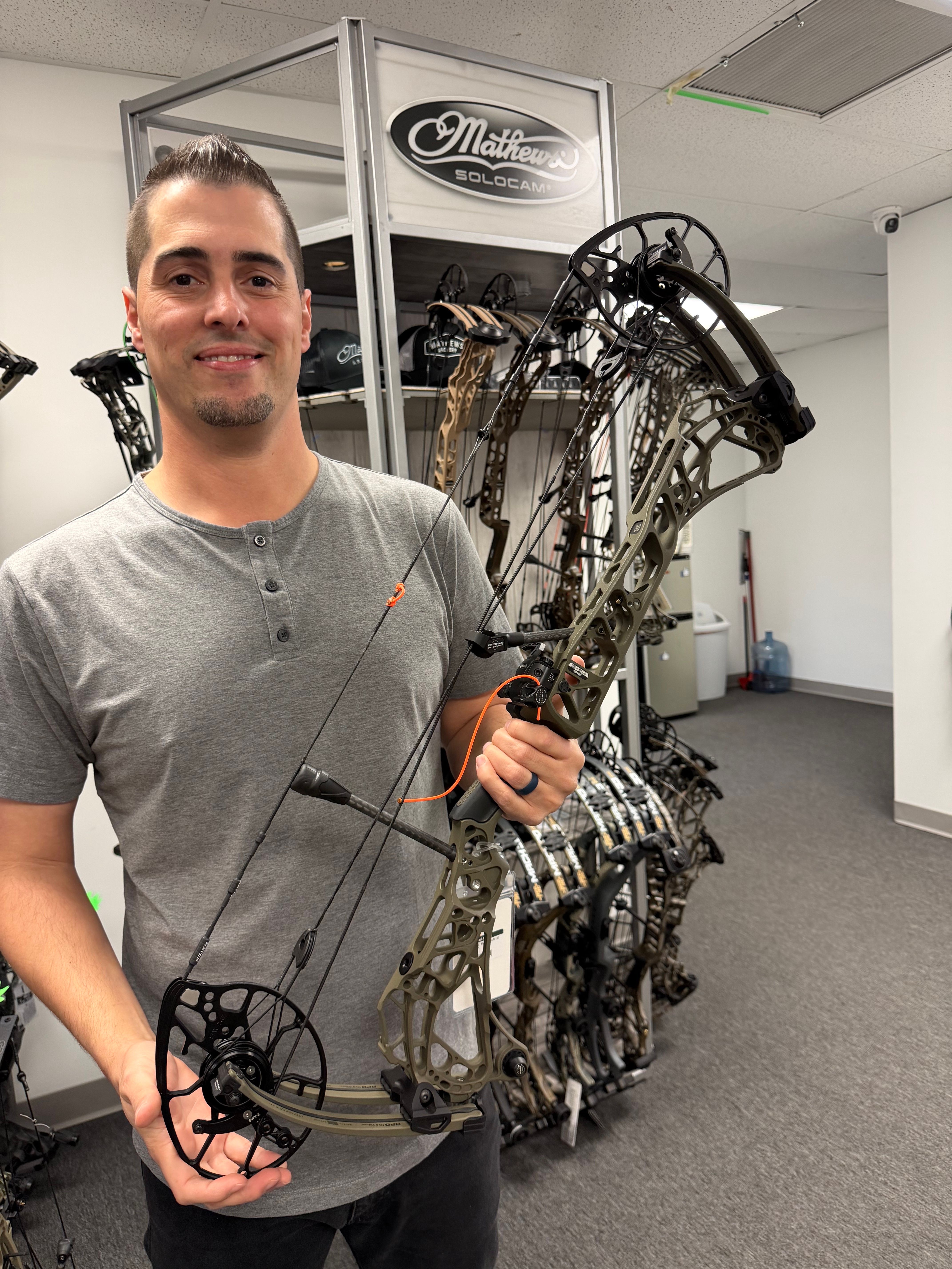 Customer with their new bow at Blessed Archery